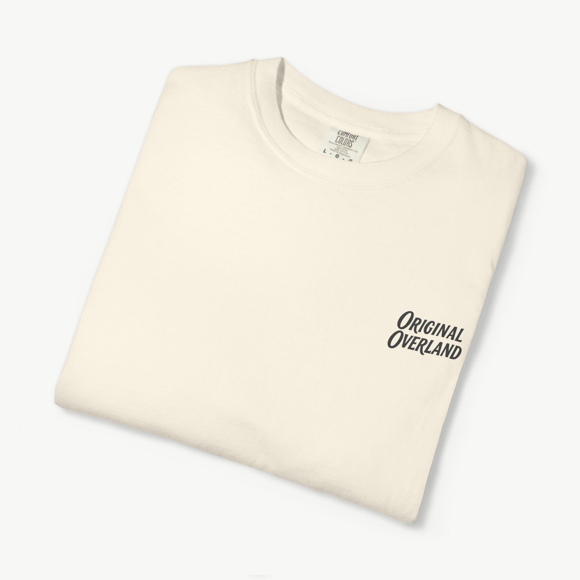 Folded ivory t-shirt with small ‘Original Overland’ chest logo.