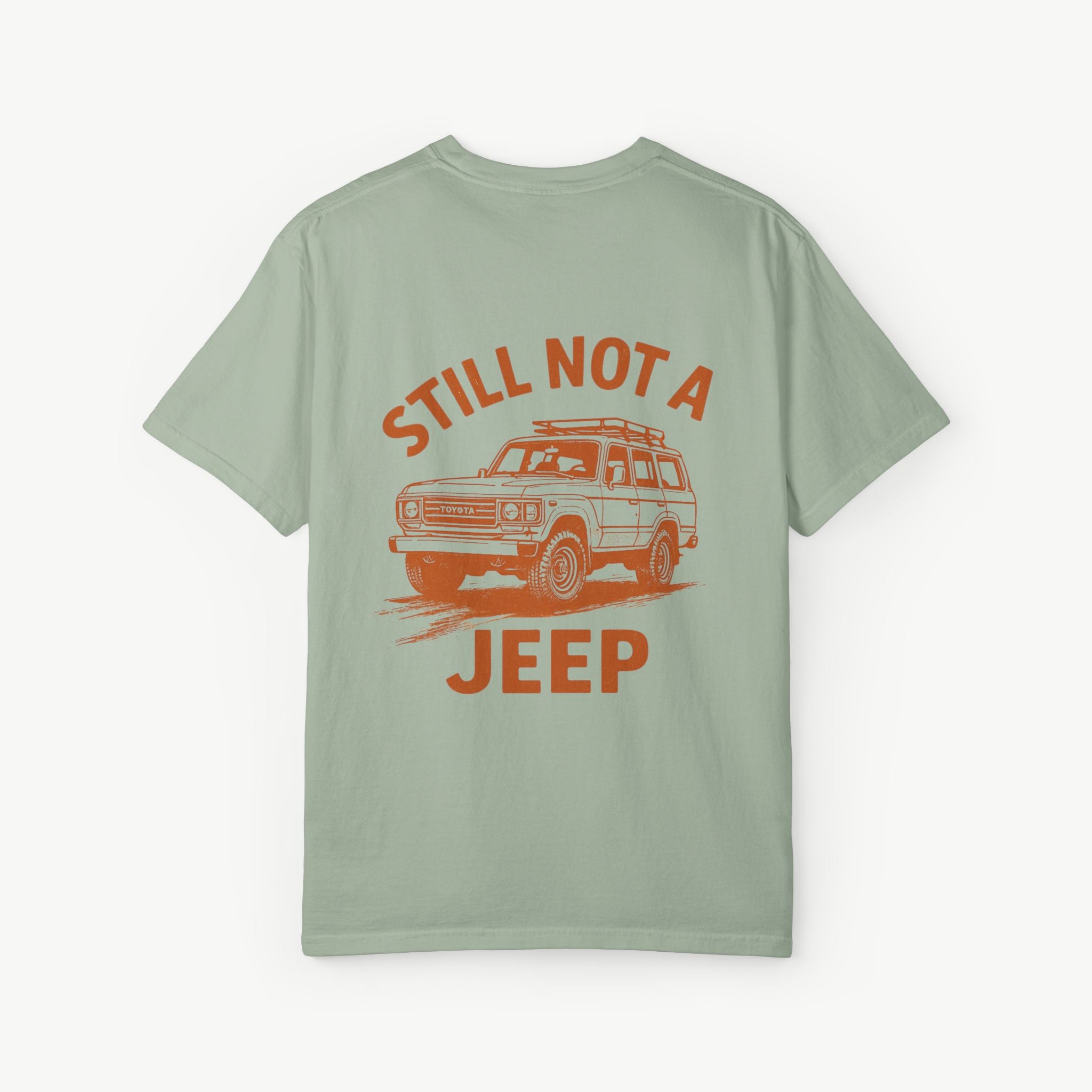 Bay FJ60 ‘Still Not a Jeep’ shirt with classic Toyota Land Cruiser illustration.