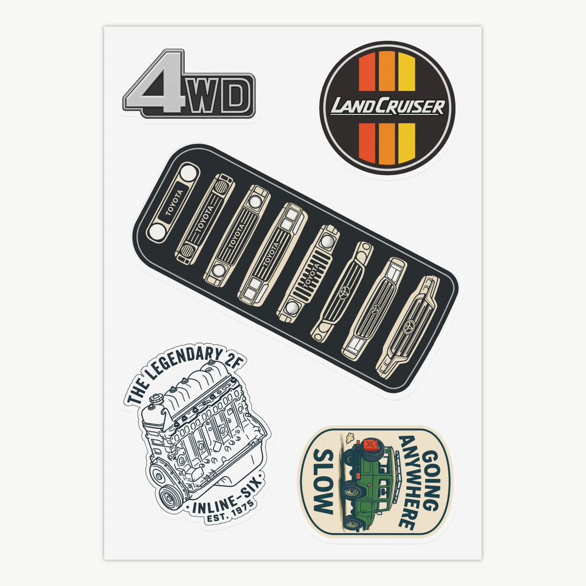 Vintage Land Cruiser vinyl sticker sheet pack featuring 8 grille generations badge, 2F inline-six engine illustration, retro 3-color Land Cruiser logo, 4WD emblem, and Going Anywhere Slow FJ40 decal.